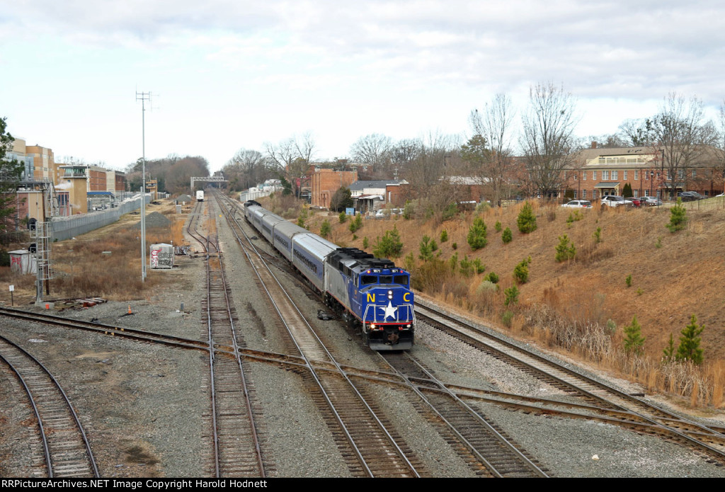 RNCX 1871 brings up the rear of train P075-30 as it backs into the station